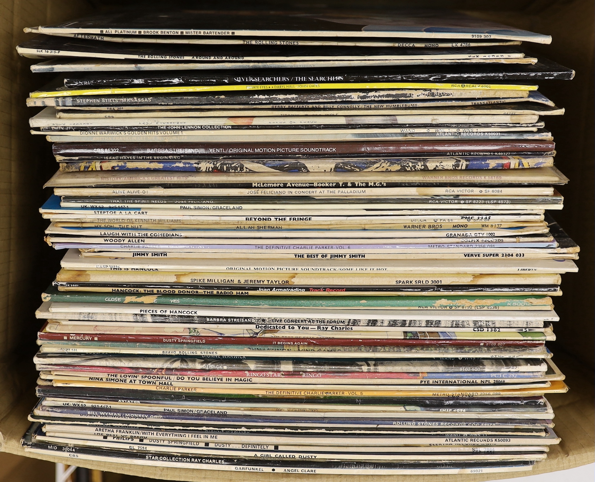 Sixty-four LP record albums with artists including; Brook Benton (signed album), Rolling Stones, Paul McCartney, Dionne Warwick, Elvis Presley, Grateful Dead, Paul Simon, Beyond the Fringe, Nina Simone, Ray Charles, John